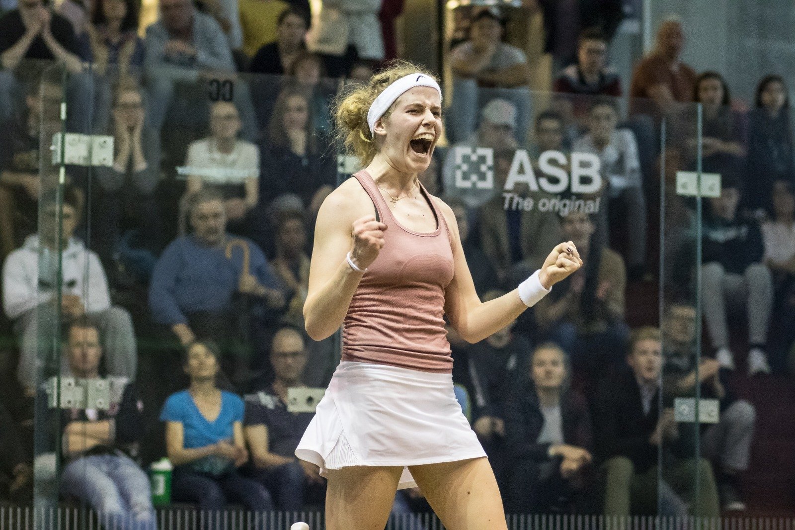 Celebrating win on the squash court